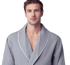 Small gray men's waffle piping robe by Plush Fashion Hub, front view showing piping details and cozy fabric.