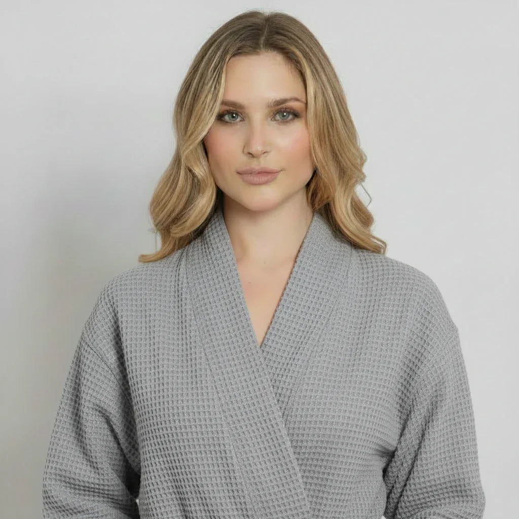Lightweight gray women's waffle robe from Plush Fashion Hub, featuring quick-dry spa comfort and soft front design.