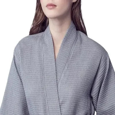 Front view of a small grey knee-length waffle robe for women by Plush Fashion Hub, featuring a kimono style with a cozy fit.