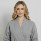Front view of a small grey knee-length waffle robe for women by Plush Fashion Hub, featuring a kimono style and cozy fabric.