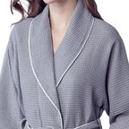 Small grey women’s waffle piping bathrobe by Plush Fashion Hub, featuring lightweight spa-style comfort and front design.