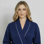 Women’s navy waffle piping bathrobe from Plush Fashion Hub, lightweight spa-style robe with front design and piping details.