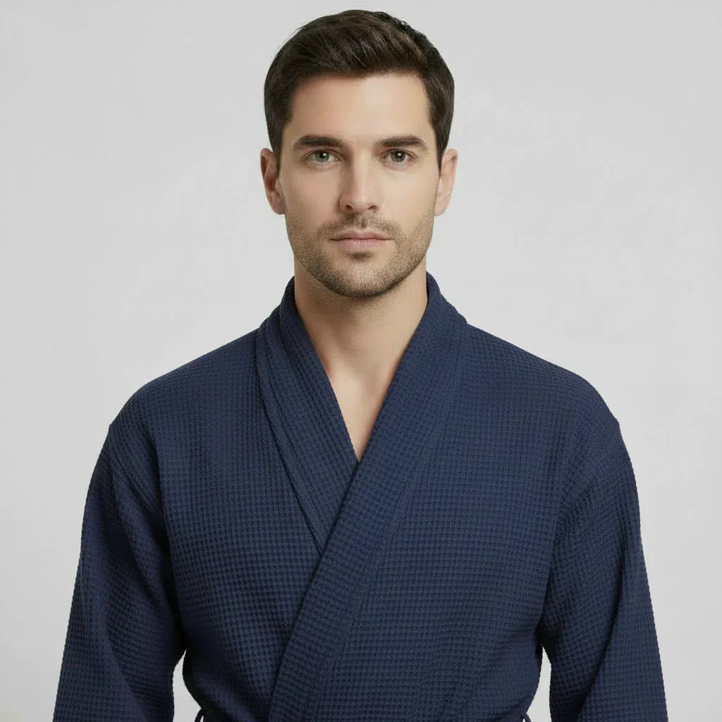 Small navy Plush Fashion Hub waffle spa bathrobe for men, lightweight and absorbent, shown from the front.