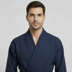 Small navy Plush Fashion Hub waffle spa bathrobe for men, lightweight and absorbent, shown from the front.