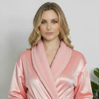 Front view of a small pink women's plush bathrobe by Plush Fashion Hub, showcasing its soft, cozy fabric and relaxed fit.