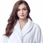 Front view of a small white women's plush bathrobe by Plush Fashion Hub, showcasing its soft, cozy fabric and relaxed fit.
