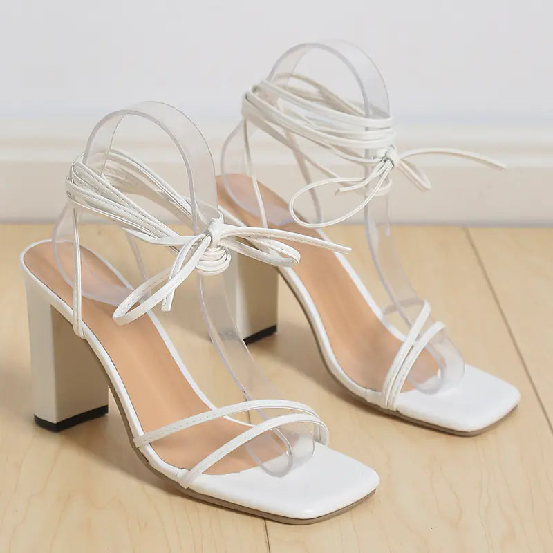 Women's simple square head strappy high heels in black, featuring sleek design and ankle straps for elegant style.