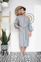 Gray plush men's waffle spa bathrobe from Plush Fashion Hub, lightweight and absorbent, ideal for comfortable post-shower wear.