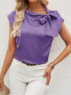 Bella Mia satin women's T-shirt with a half-open collar and bow detail, featuring a special interest design and stylish satin fabric.
