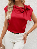 Bella Mia satin women's T-shirt with a half-open collar and bow detail, featuring a special interest design.