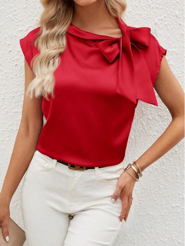 Bella Mia satin women's T-shirt with a half-open collar and bow detail, featuring a special interest design.