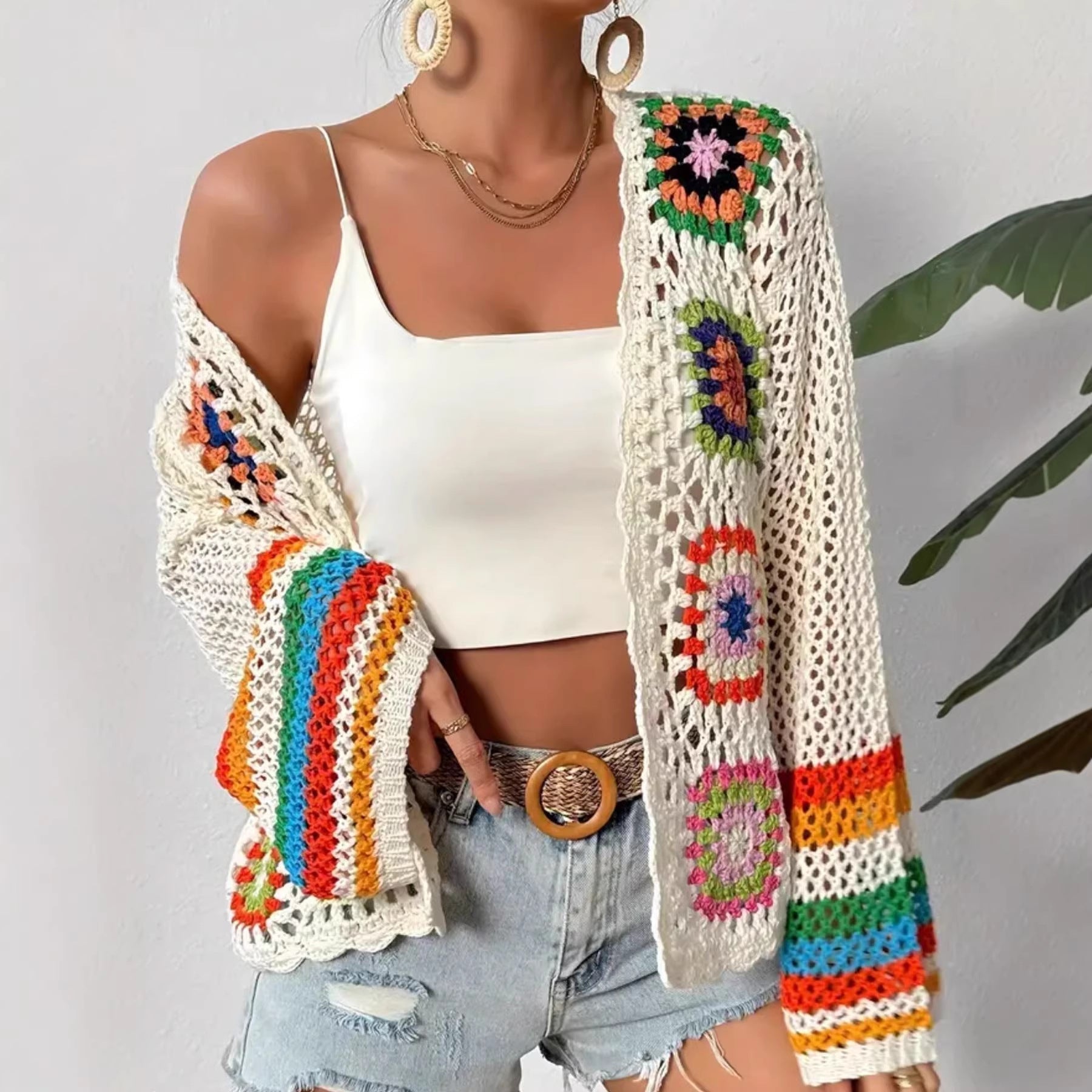 Hand-crocheted knitted women's cardigan by Plush Fashion Hub, featuring cozy, textured design and long sleeves.