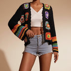Hand-crocheted knitted women's cardigan in soft yarn, featuring a cozy, stylish design from Plush Fashion Hub.