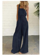 High-waisted sleeveless wide-leg denim jumpsuit by Plush Fashion Hub in 8 colors, available in sizes S to 2XL.
