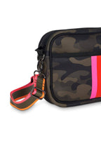 Black neoprene crossbody bag from Threaded Pear with adjustable strap and minimalist design, shown hanging on a hook.