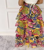Fasheabe Blissful Views printed ruffled high-low skirt with flowing fabric and ruffle details, styled as a fashionable women's bottom.