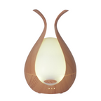 Timeless Diffuser from Timeless Organics Skin Care with sleek design and diffuser openings, ideal for calming aromatherapy.