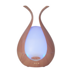 Timeless Diffuser by Timeless Organics Skin Care displaying a sleek diffuser with aromatic essential oils in a modern setting.