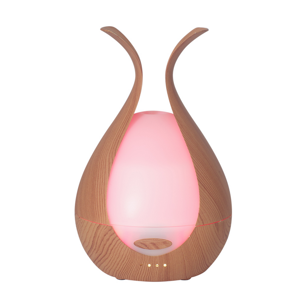Timeless Diffuser from Timeless Organics Skin Care with sleek design and an aromatic diffuser bulb on a neutral background.