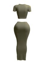 Short sleeve crop top and long skirt set by The House of Stylez, featuring a stylish matching two-piece outfit.