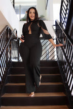 Fasheabe La Mesh Inserted Fashion Jumpsuit playsuit featuring a stylish mesh insert design and fitted silhouette.
