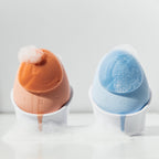 Timeless Organics Skin Care facial cleansing brush device with soft bristles for gentle skin cleansing and exfoliation.