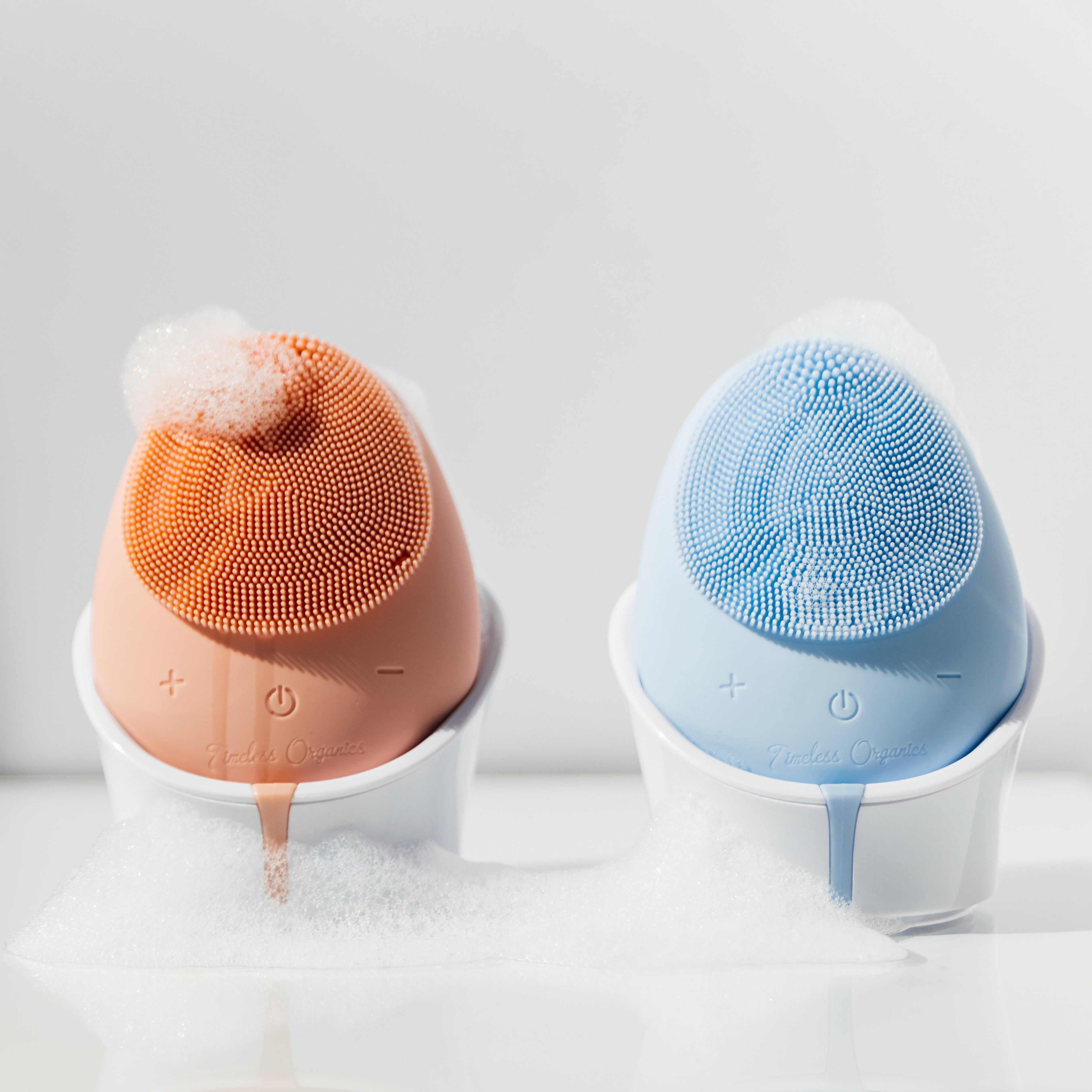 Timeless Organics Skin Care facial cleansing brush device with soft bristles for gentle skin cleansing and exfoliation.