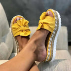 Women’s bow sandals with platform wedge heel from Trendy Attic Store01, featuring stylish straps and a comfortable, trendy design.