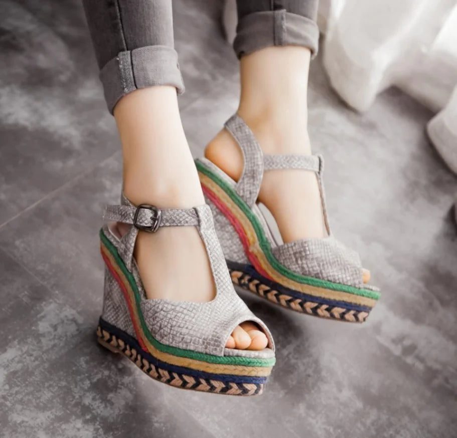 Women's high heel wedge sandals with thick soles and stylish straps, perfect for trendy summer footwear.