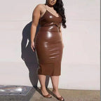 Plus size women's stylish autumn winter leather dress by Trendy Attic Store01, featuring a chic, fitted design with long sleeves.