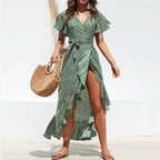 Women’s summer floral high-waist chiffon dress with V-neck, flowing fabric, perfect for warm weather and casual occasions.