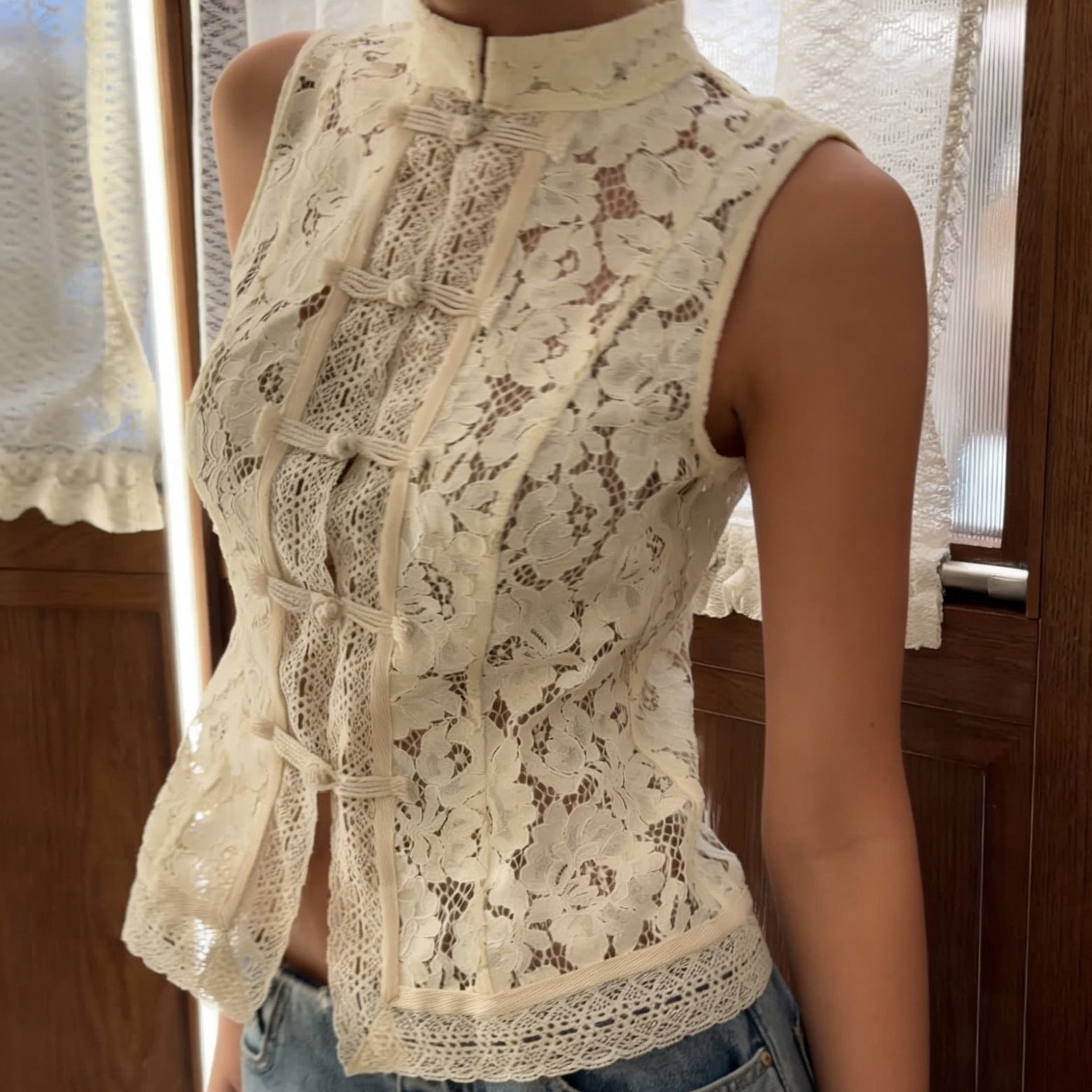 Lace crochet sleeveless top with stand collar in three colors, slim fit, casualwear from Plush Fashion Hub.