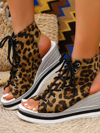 Women's lace-up open toe wedge sandals with a comfortable mid-heel, perfect for summer, from Trendsi.