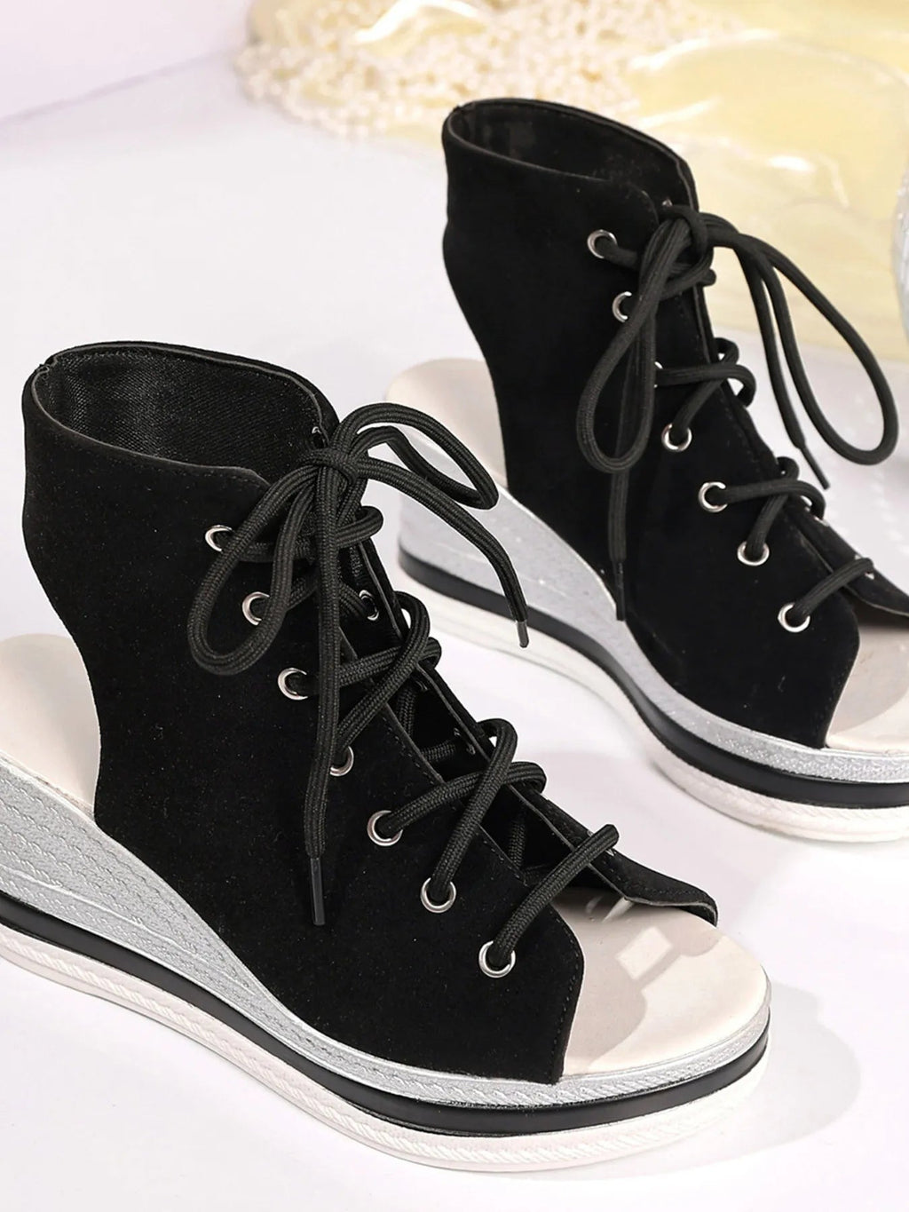 Women's lace-up open toe wedge sandals with comfortable mid-heel and stylish design, perfect for summer wear.