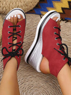 Women's lace-up open-toe wedge sandals with a comfortable mid-heel in a stylish summer shoe design by Trendsi.