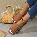 Women's leopard print open toe flat sandals by Trendsi, casual summer shoes with comfortable flat sole and stylish animal print design.