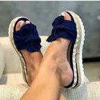 Women’s bow sandals with platform wedge heel by Trendy Attic Store01, featuring stylish bow detail and comfortable wedge sole.