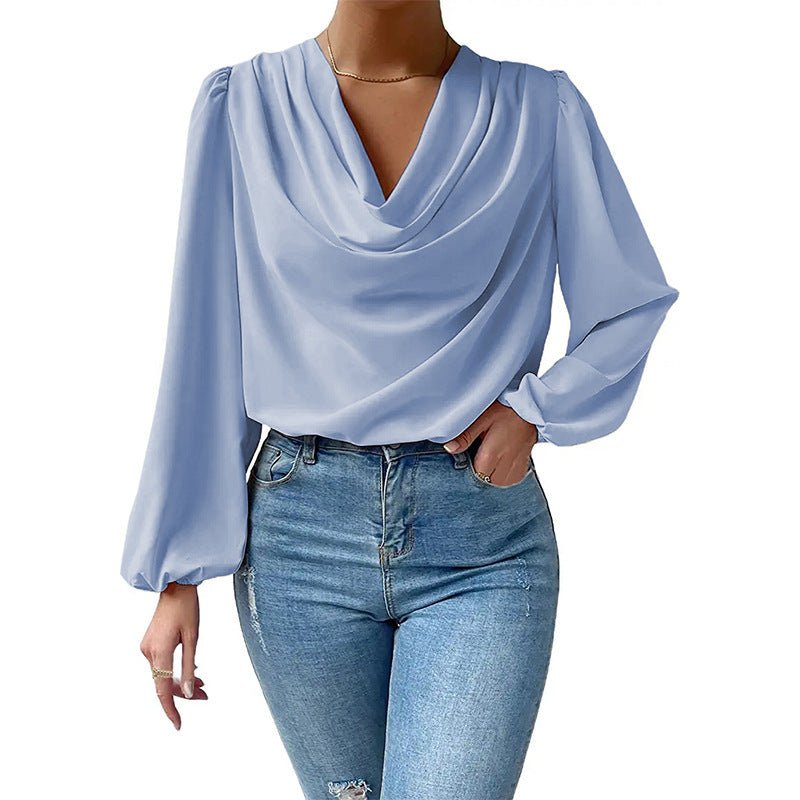Loose draped long-sleeved V-neck shirt for women, Bella Mia brand, casual top with relaxed fit and soft fabric.