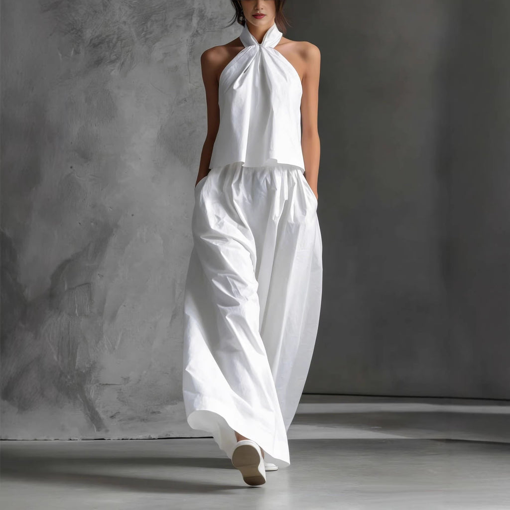 Casual two-piece set from Plush Fashion Hub featuring a loose-fitting sleeveless top and wide-leg pants, perfect for relaxed wear.