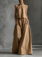 Casualwear two-piece set with loose-fitting sleeveless top and wide-leg pants by Plush Fashion Hub, shown in a relaxed, stylish fit.