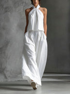 Casualwear two-piece set by Plush Fashion Hub with a loose-fitting sleeveless top and wide-leg pants, perfect for relaxed style.