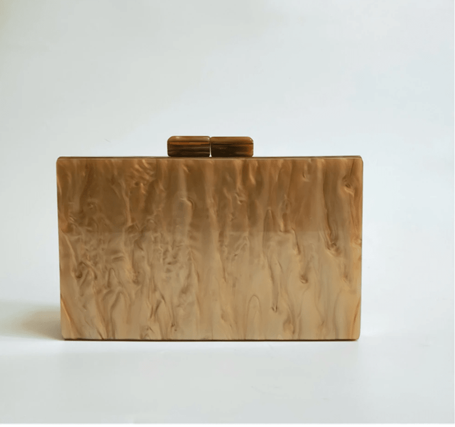 Black Luxe Clutch purse by Plush Fashion Hub with sleek design and gold-tone hardware, perfect for evening occasions.