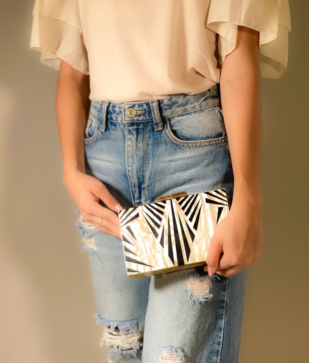 Black Luxe Clutch handbag by Plush Fashion Hub with sleek design and elegant finish.