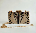 Black Luxe Clutch handbag by Plush Fashion Hub with sleek design and elegant finish, perfect for evening or formal occasions.