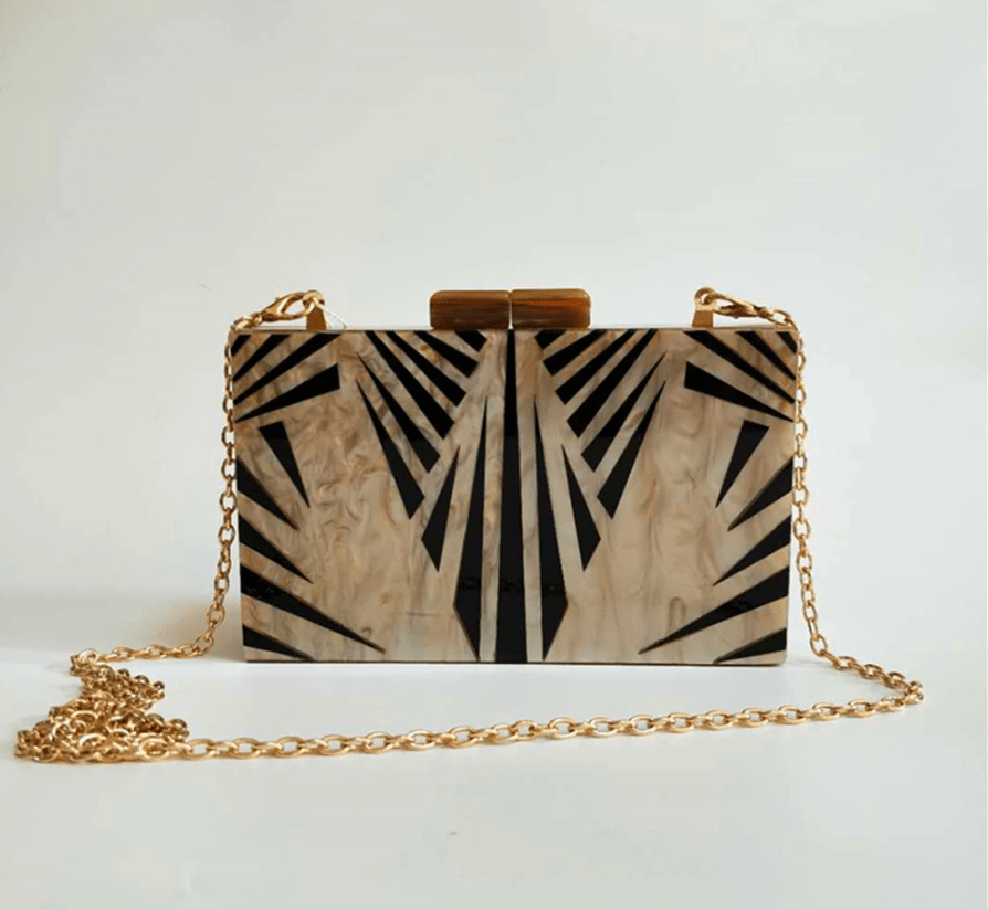 Black Luxe Clutch handbag by Plush Fashion Hub with sleek design and elegant finish, perfect for evening or formal occasions.