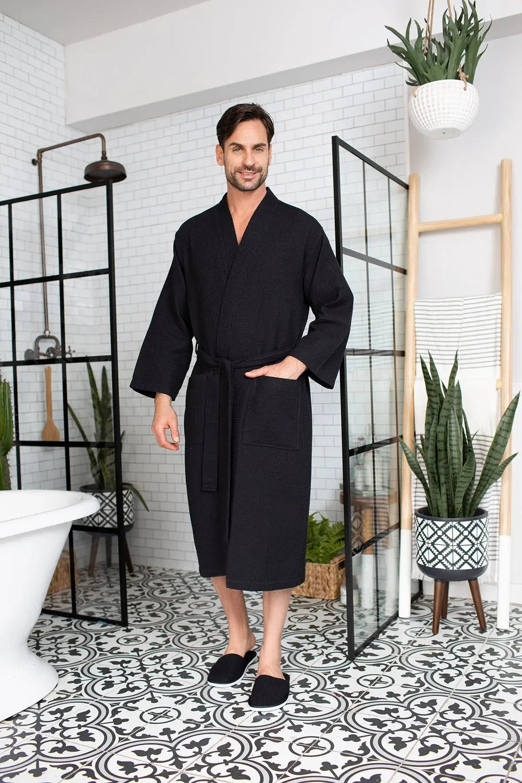 Men's plush waffle spa bathrobe from Plush Fashion Hub, lightweight and absorbent, shown hanging with a shawl collar and tie waist.