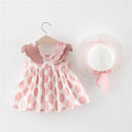 Girls summer princess dress with large polka dots and matching hat, featuring wings for a whimsical, fairy-tale look.