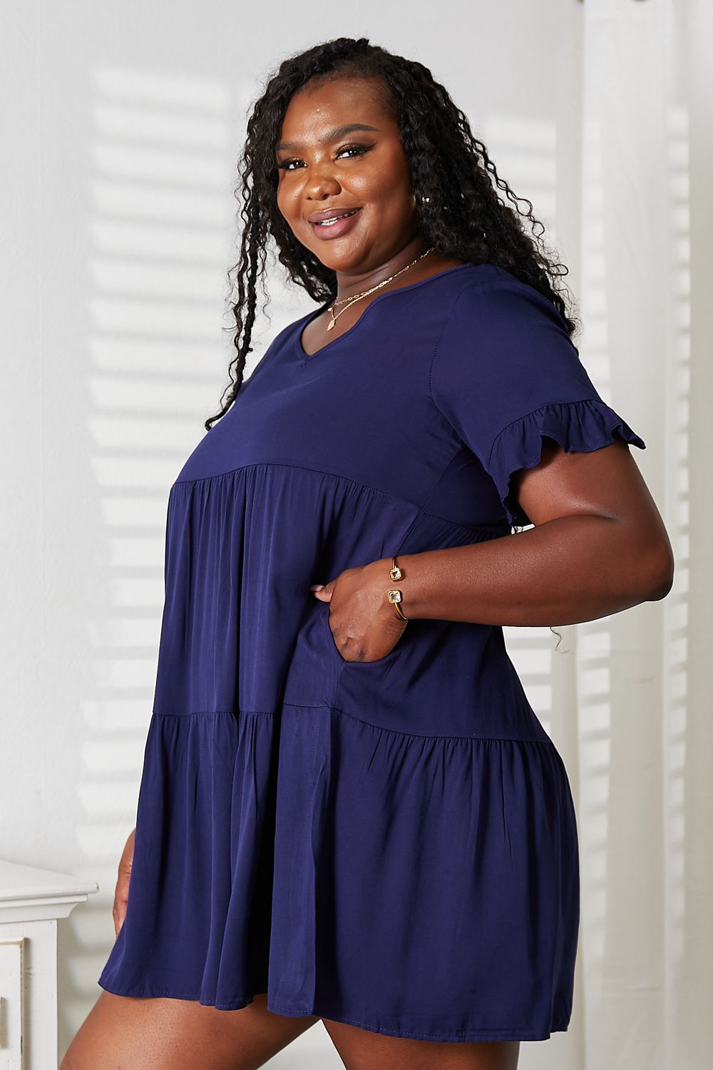 Mandy women's solid V-neck casual dress with tiered flounce sleeves, stylish and comfortable women’s apparel by Trendsi.