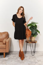 Mandy women's solid V-neck tiered casual dress with flounce sleeves, stylish and comfortable women's apparel by Trendsi.
