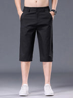 Men's plus size casual stretch shorts with pockets, featuring a comfortable fit and versatile style for everyday wear.